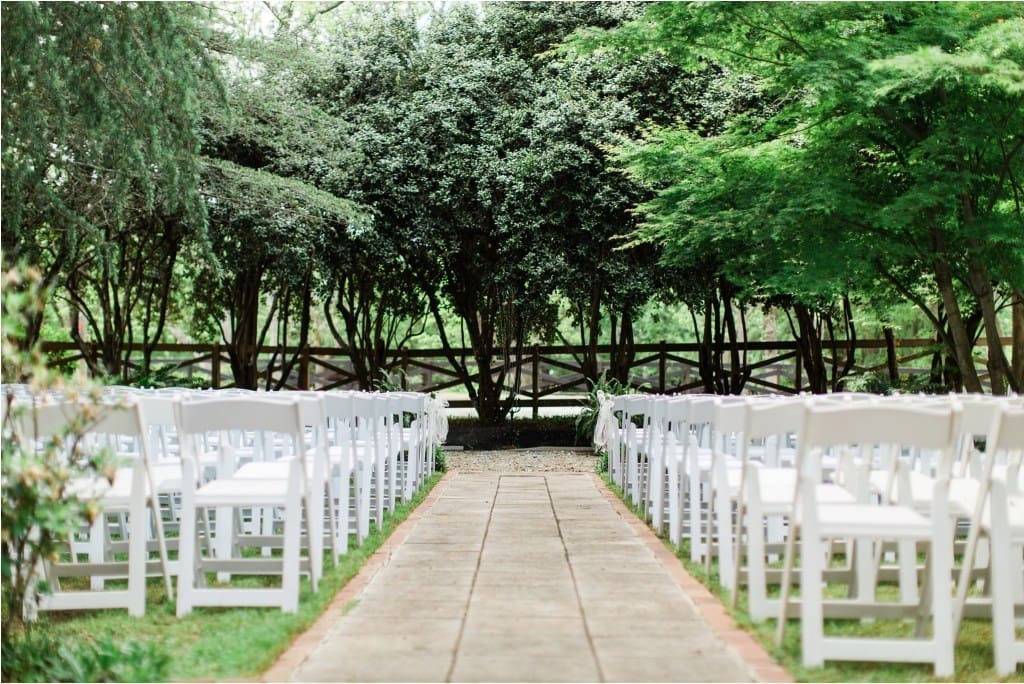 Roman Bath Venue Set With White Garden Chairs